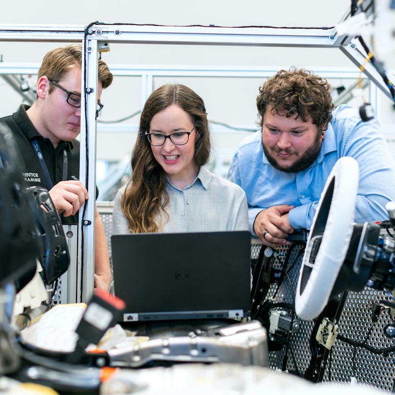 Engineers in Workshop, image via Pexels (adapted from source: https://www.pexels.com/photo/engineers-in-workshop-3862627/)